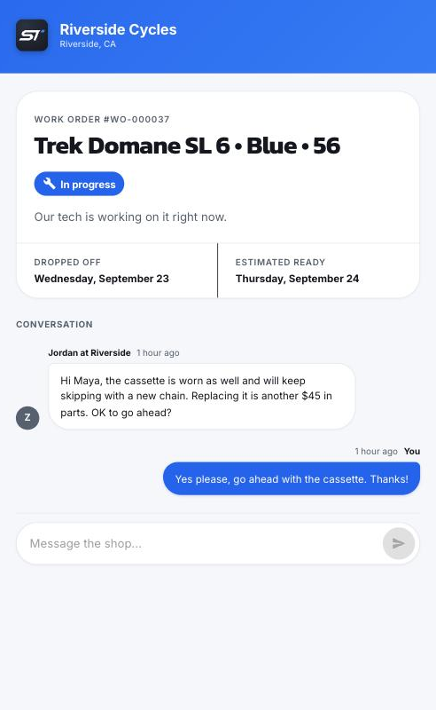 The ShopTech customer portal on a phone: the work order and bike, an In progress status, drop-off and estimated ready dates, and a two-way message thread with the shop.